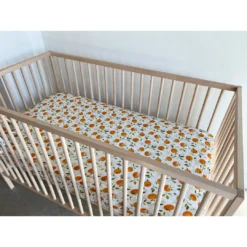Orange Blossom Muslin Crib Sheet - Arrows & Bow X Joss + J Crib Sheets