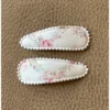 Minikane Ivory Dainty Floral Pig Tail Clips Headwear